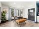 Bright dining area featuring a round wooden table, comfortable seating, and natural light at 3327 Pineview Dr, Holiday, FL 34691