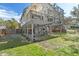 Charming two-story home with a spacious backyard perfect for outdoor activities and gatherings at 3327 Pineview Dr, Holiday, FL 34691