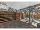 View of under house and partial lot showing wooden fence at 3327 Pineview Dr, Holiday, FL 34691