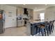 Stylish kitchen features an island with seating and modern appliances at 34110 Jasper Stone Dr, Wesley Chapel, FL 33543