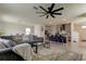 Spacious living area with open floor plan connected to the kitchen at 34110 Jasper Stone Dr, Wesley Chapel, FL 33543