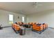 Stylish lounge area featuring modern seating arrangements and a well-lit space at 34110 Jasper Stone Dr, Wesley Chapel, FL 33543