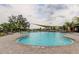 Community pool with plenty of seating and lush landscaping, perfect for relaxation at 34110 Jasper Stone Dr, Wesley Chapel, FL 33543
