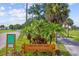 Coquina Key Park entrance sign amidst lush greenery, inviting visitors to enjoy the recreational facilities at 4401 Neptune Se Dr, St Petersburg, FL 33705