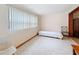 Sunlit bedroom space with neutral tones, tile floor, and a cozy atmosphere at 504 Cara Ct # 504, Largo, FL 33771