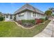 Well-maintained home with manicured landscaping and a classic corner lot at 504 Cara Ct # 504, Largo, FL 33771