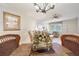 Well-lit dining area with seating for four and connection to living space at 5267 81St N St # 18, St Petersburg, FL 33709