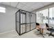 Fun jail house with an outdoor view, table and chairs within, and a 'Jail House' sign at 5267 81St N St # 18, St Petersburg, FL 33709