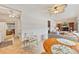 View of the kitchen transitioning to the living room, which features comfortable seating and entertainment center at 5267 81St N St # 18, St Petersburg, FL 33709