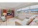 This cozy living room features comfortable seating and a wooden entertainment center at 5267 81St N St # 18, St Petersburg, FL 33709