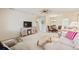Open-concept living area showing comfortable seating, TV area, and connection to dining space at 5267 81St N St # 18, St Petersburg, FL 33709