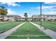 Outdoor community shuffleboard courts with covered seating and well-maintained grounds at 5267 81St N St # 18, St Petersburg, FL 33709