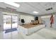 A community center stage featuring a podium with an office chair and flags on the side at 5267 81St N St # 18, St Petersburg, FL 33709
