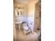 Cozy bathroom featuring tiled walk-in shower, pedestal sink, and decorative touches at 531 Luzon Ave, Tampa, FL 33606