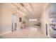 Open dining room with stylish light fixture, tiled flooring and neutral walls at 531 Luzon Ave, Tampa, FL 33606