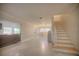 Bright open-concept living area with tiled floors and access to multiple rooms at 531 Luzon Ave, Tampa, FL 33606