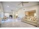 Spacious living area with vaulted ceilings, multiple fans, and lots of natural light at 531 Luzon Ave, Tampa, FL 33606