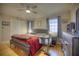 Comfortable bedroom featuring hardwood floors and neutral paint at 531 Luzon Ave, Tampa, FL 33606
