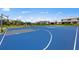 Community blue basketball court with basketball hoops for residents to enjoy an active lifestyle at 5622 Silverside Pine Ct, Lakewood Ranch, FL 34211