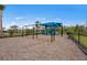 Community playground with swings and a slide. A shaded area for children to enjoy at 5622 Silverside Pine Ct, Lakewood Ranch, FL 34211