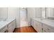 Bathroom with double sink vanity and granite countertops at 700 Starkey Rd # 1111, Largo, FL 33771