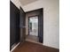 Exterior entryway featuring neutral paint, security doors, and tiled floors at 700 Starkey Rd # 1111, Largo, FL 33771