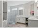 Luxurious bathroom with a walk-in shower, a soaking tub, and modern fixtures at 7811 Roma Dune Dr, Wesley Chapel, FL 33545