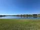 Scenic view of the tranquil pond behind the house at 7811 Roma Dune Dr, Wesley Chapel, FL 33545