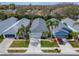 Charming single-Gathering homes with well-kept lawns and driveways, featuring lovely landscaping and colorful exteriors at 8141 Ambersweet Pl, Land O Lakes, FL 34637