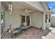 Charming patio with a ceiling fan offers a comfortable outdoor space for entertaining or relaxation at 8141 Ambersweet Pl, Land O Lakes, FL 34637