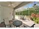 Covered patio with brick pavers, ceiling fan, and access to the outdoors, perfect for relaxing at 8141 Ambersweet Pl, Land O Lakes, FL 34637
