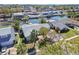 Aerial view of neighborhood homes, several with canal access and boat docks at 8448 Flagstone Dr, Tampa, FL 33615