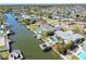 Waterfront homes with docks and boats line the canal in this desirable community at 8448 Flagstone Dr, Tampa, FL 33615