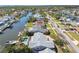 Waterfront neighborhood with homes situated along a canal, many featuring private pools and docks at 8448 Flagstone Dr, Tampa, FL 33615