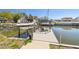 Enjoy boating from your backyard on a dock that features a boat lift and views of the water at 8448 Flagstone Dr, Tampa, FL 33615