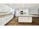 Open kitchen with granite countertops, stainless steel appliances, and a central island at 8448 Flagstone Dr, Tampa, FL 33615