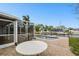 Enjoy outdoor living with a pool that has canal access, and a patio for entertaining at 8448 Flagstone Dr, Tampa, FL 33615