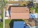 Aerial view of the home showing the roof, landscaping, and surrounding neighborhood at 8534 Carriage Pointe Dr, Gibsonton, FL 33534