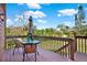 Balcony showcasing outdoor furniture and a lush green view creating a serene retreat at 9222 134Th St, Seminole, FL 33776