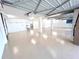 Bright and spacious basement features painted walls and floors, offering potential for customization at 9222 134Th St, Seminole, FL 33776