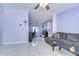 View of living room into office space with tile flooring and neutral paint at 9319 Ashfield Ct, Tampa, FL 33615