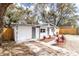 Stylish home featuring a fresh exterior and updated landscaping for enhanced curb appeal at 9607 N 13Th St, Tampa, FL 33612