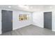 Bright, open living area featuring neutral paint, recessed lighting and waterproof vinyl flooring at 9607 N 13Th St, Tampa, FL 33612