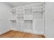 Walk-in closet with custom built-in shelving and drawers for optimal organization at 1015 1/2 W Charter St, Tampa, FL 33602