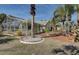 Fenced backyard with tropical landscaping and view of screened patio at 10302 Belltower St, Spring Hill, FL 34608