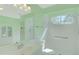 A quaint bathroom offers a standing shower, toilet, and vanity sink at 10302 Belltower St, Spring Hill, FL 34608