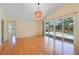 Inviting living space featuring patio access and a modern chandelier at 10302 Belltower St, Spring Hill, FL 34608