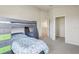 Bedroom with bunk bed, large closet and plenty of natural light at 10642 Mistflower Ln, Tampa, FL 33647