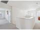 The second floor hallway features an open layout and recessed lighting at 10642 Mistflower Ln, Tampa, FL 33647