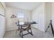 Office space features a desk and a window that provides natural light at 10642 Mistflower Ln, Tampa, FL 33647